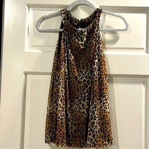 Fine mesh animal print tank top.